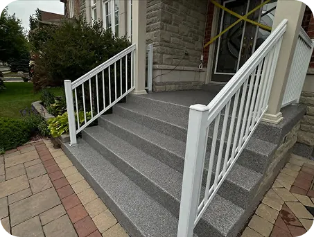 Front porch steps finished with grey speckled coating