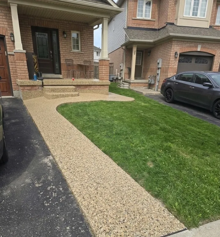 Walkway and steps with a beige speckled coating