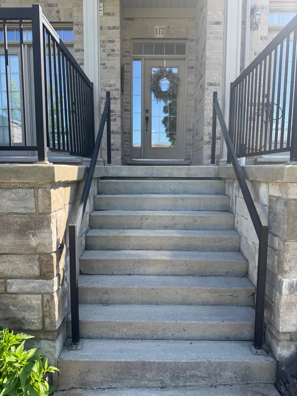 Uncoated concrete entry steps and landing